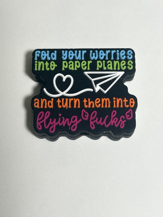 Fold your worries into paper planes and turn them into flying fucks